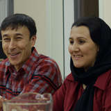 Afghan couple sharing a meal